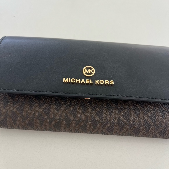 Michael Kors Handbags - Michael Kors Black and Brown Logo Wallet
Trifold.